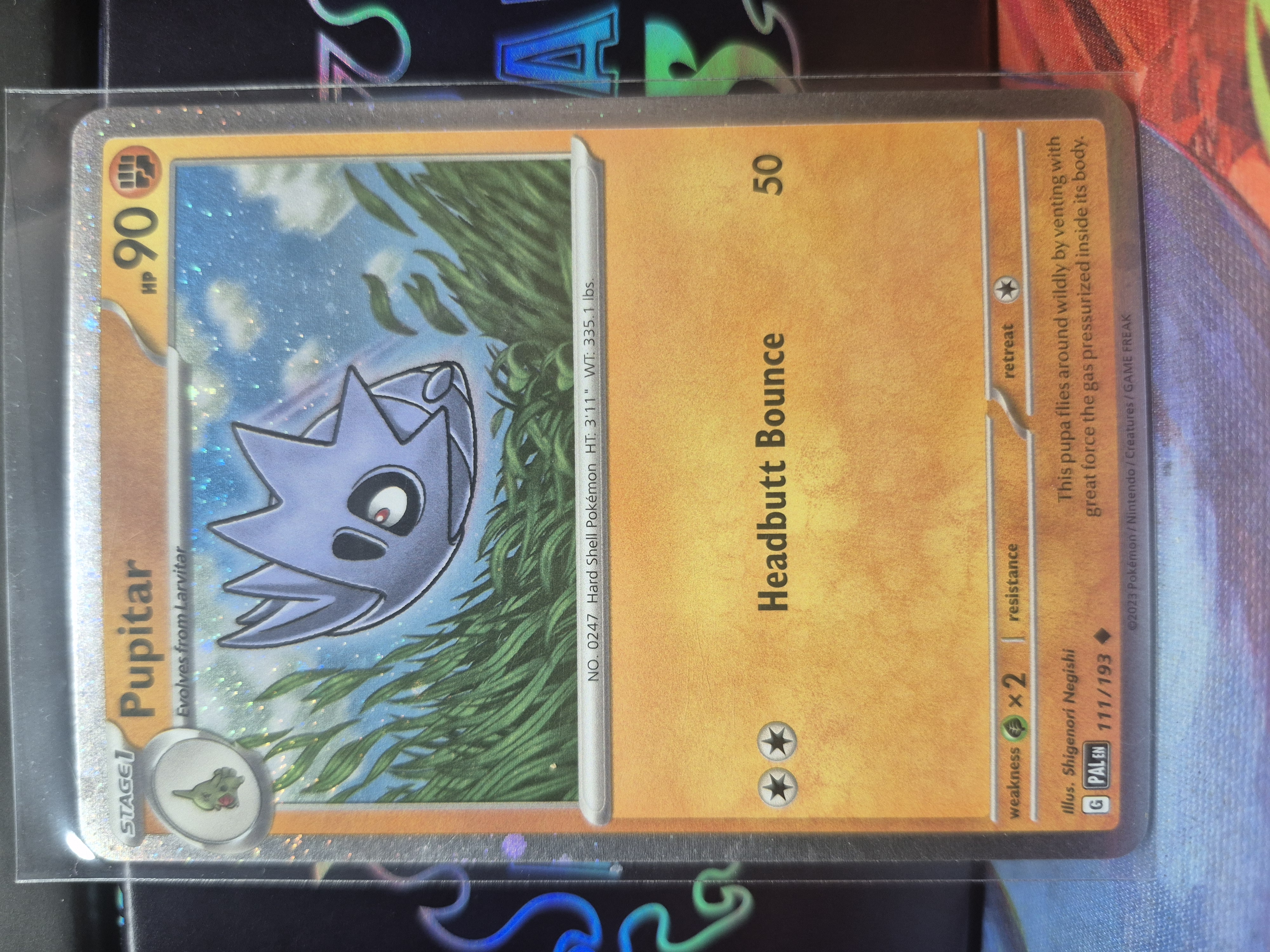 Pupitar 111/193 Cosmos Paldea Evolved NM